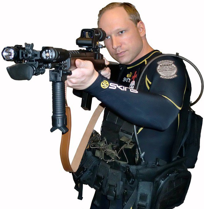 Anders Breivik in a self portrait, wearing a diving suit, holding a gun