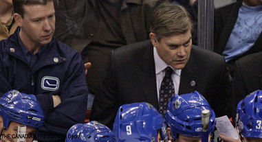 Assistant coach, Ryan Walter (center)