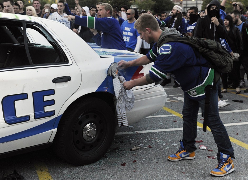 Nathan Kotylak tries to set fire to a Vacouver Police cruiser