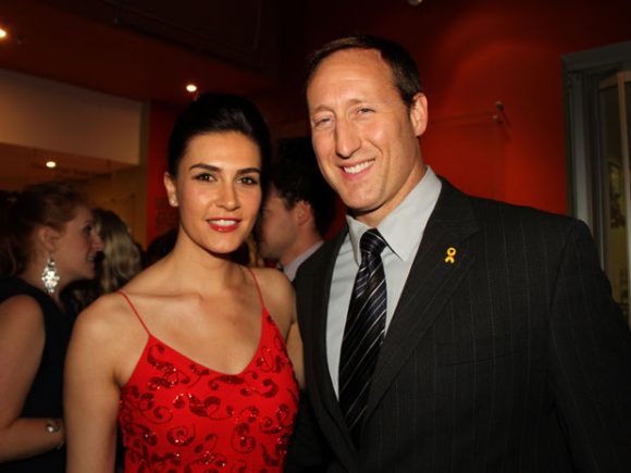 Nazanin Afshin-Jam and Peter MacKay at a function