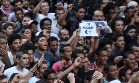 Muslims and Christians protest at the US embassy in Cairo